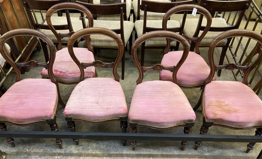 A set of six Victorian rosewood spoon back dining chairs